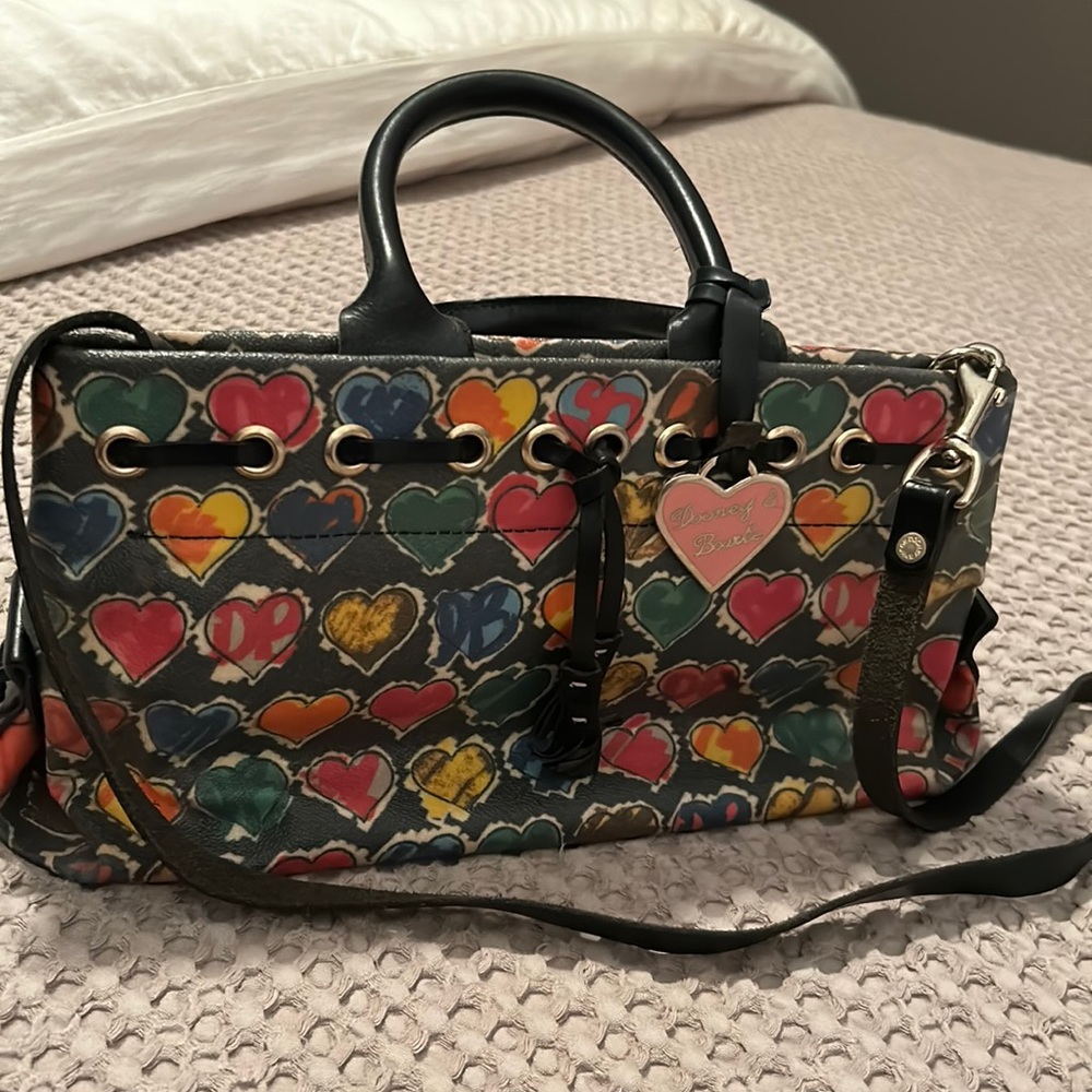 Dooney and bourke heart handbag. With removable 37” leather strap
